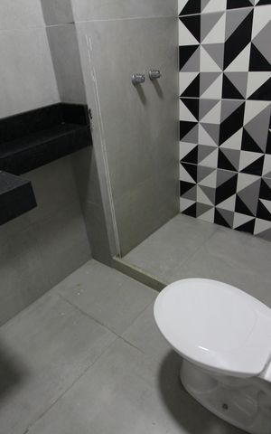 Casa de condomínio à venda com 150m², 4 quartos e 1 vagaBanheiro Social