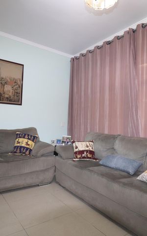Casa à venda com 107m², 2 quartos e 2 vagasSala