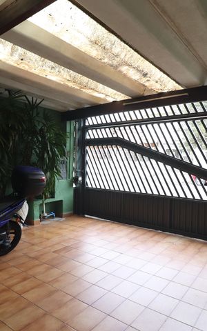 Casa à venda com 107m², 2 quartos e 2 vagasGaragem