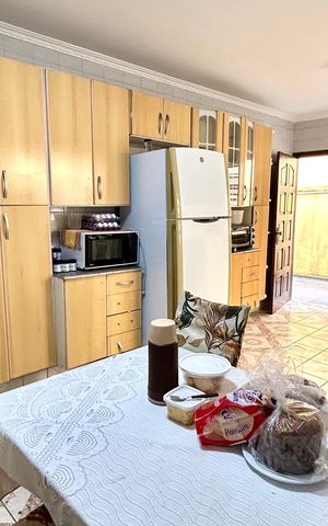 Casa à venda com 235m², 3 quartos e 3 vagas Casa à venda com 235m², 3 quartos e 3 vagasCozinha