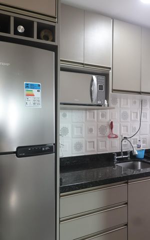 Apartamento à venda com 60m², 2 quartos e 1 vagaCozinha e Área de Serviço
