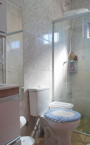 Casa à venda com 186m², 3 quartos e 2 vagasBanheiro