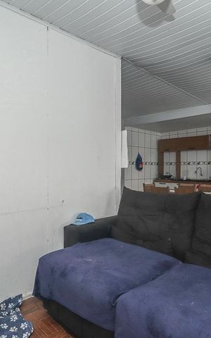 Casa à venda com 100m², 2 quartos e 2 vagasSala