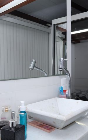 Casa à venda com 400m², 5 quartos e 6 vagasBanheiro da Suíte 2