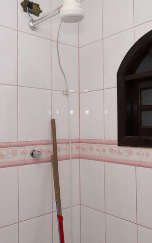 Casa à venda com 400m², 5 quartos e 6 vagasBanheiro da Suíte 4