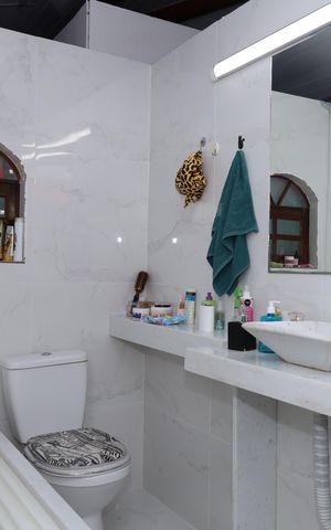 Casa à venda com 400m², 5 quartos e 6 vagasBanheiro da Suíte 2