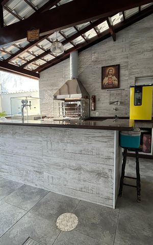 Casa de condomínio à venda com 400m², 4 quartos e 5 vagasEspaço Gourmet
