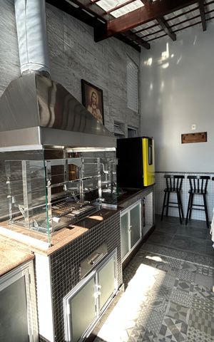 Casa de condomínio à venda com 400m², 4 quartos e 5 vagasEspaço Gourmet