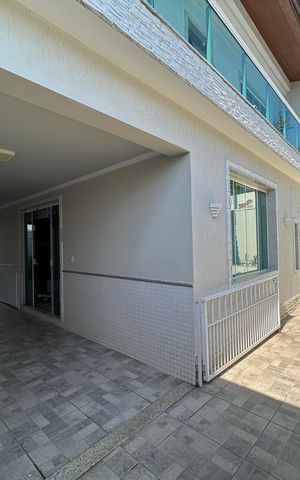 Casa de condomínio à venda com 400m², 4 quartos e 5 vagasGaragem / Fachada