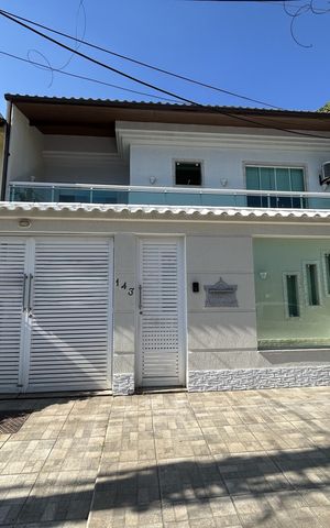 Casa de condomínio à venda com 400m², 4 quartos e 5 vagasFachada + placa