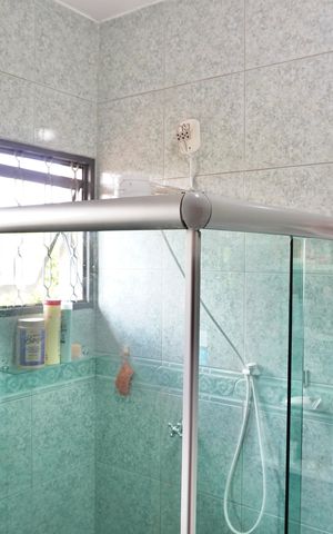 Casa à venda com 210m², 3 quartos e 3 vagas Casa à venda com 210m², 3 quartos e 3 vagasBanheiro da Suíte