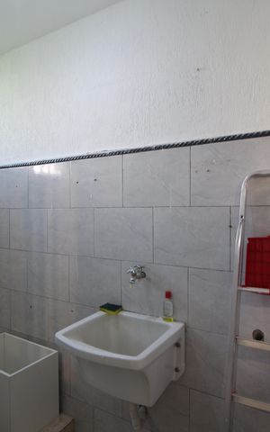 Casa de condomínio à venda com 60m², 2 quartos e 2 vagasÁrea de Serviço