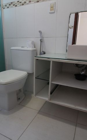 Casa de condomínio à venda com 60m², 2 quartos e 2 vagasBanheiro Social