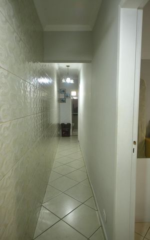 Casa à venda com 127m², 3 quartos e 2 vagasCorredor dos quartos 
