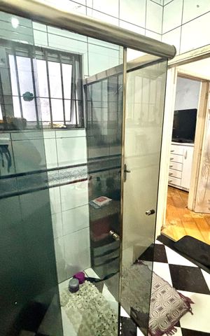 Casa à venda com 125m², 3 quartos e 2 vagas Casa à venda com 125m², 3 quartos e 2 vagasBanheiro da Suíte 1