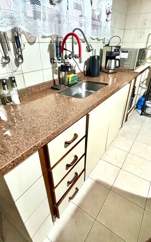 Casa à venda com 125m², 3 quartos e 2 vagas Casa à venda com 125m², 3 quartos e 2 vagasCozinha