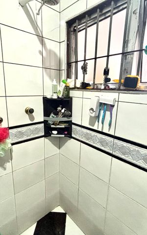 Casa à venda com 125m², 3 quartos e 2 vagas Casa à venda com 125m², 3 quartos e 2 vagasBanheiro da Suíte 1