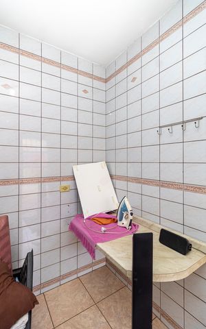 Casa à venda com 6m², 3 quartos e 2 vagas Casa à venda com 6m², 3 quartos e 2 vagasCozinha 3