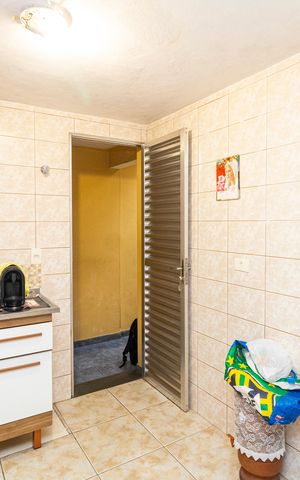 Casa à venda com 6m², 3 quartos e 2 vagas Casa à venda com 6m², 3 quartos e 2 vagasCozinha