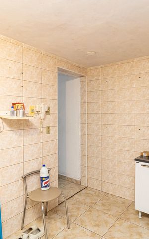 Casa à venda com 6m², 3 quartos e 2 vagas Casa à venda com 6m², 3 quartos e 2 vagasCozinha
