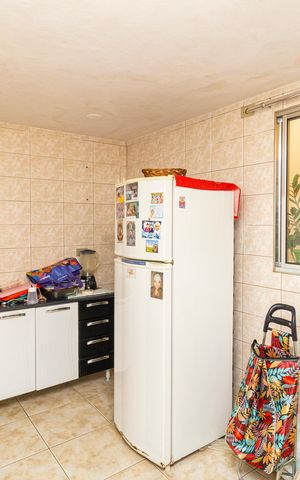 Casa à venda com 6m², 3 quartos e 2 vagas Casa à venda com 6m², 3 quartos e 2 vagasCozinha