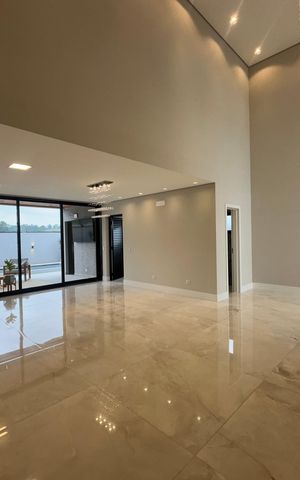 Casa de condomínio à venda com 323m², 4 quartos e 6 vagas Casa de condomínio à venda com 323m², 4 quartos e 6 vagasSala