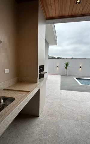 Casa de condomínio à venda com 323m², 4 quartos e 6 vagas Casa de condomínio à venda com 323m², 4 quartos e 6 vagasChurrasqueira