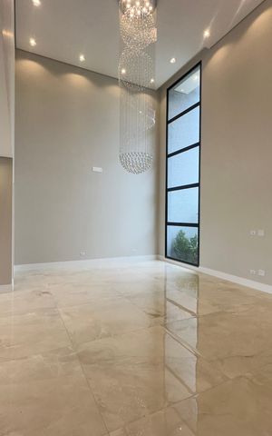 Casa de condomínio à venda com 323m², 4 quartos e 6 vagas Casa de condomínio à venda com 323m², 4 quartos e 6 vagasSala