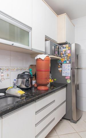 Casa de condomínio à venda com 164m², 4 quartos e 2 vagasCozinha e Área de Serviço