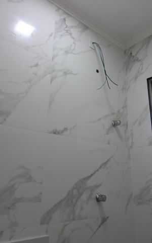 Casa à venda com 170m², 3 quartos e 3 vagasBanheiro da Suíte 1