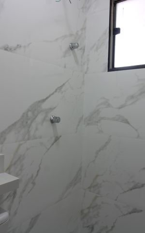 Casa à venda com 170m², 3 quartos e 3 vagasBanheiro da Suíte 1