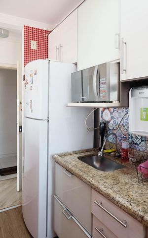 Apartamento à venda com 62m², 3 quartos e 1 vaga Apartamento à venda com 62m², 3 quartos e 1 vagaCozinha e Área de Serviço