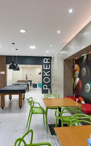 Apartamento à venda com 105m², 3 quartos e 2 vagas Apartamento à venda com 105m², 3 quartos e 2 vagasÁrea comum - Salão de jogos