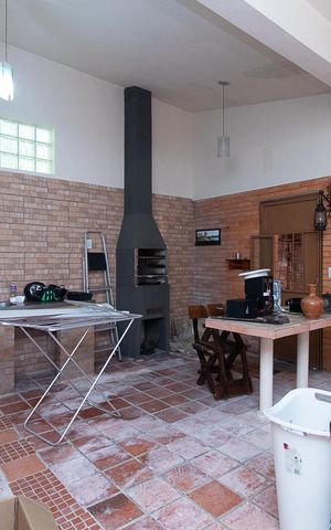 Casa à venda com 320m², 5 quartos e 2 vagasChurrasqueira
