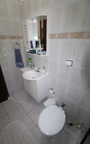 Casa para alugar com 200m², 4 quartos e 2 vagasBanheiro 2
