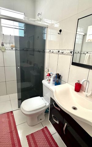 Casa à venda com 125m², 5 quartos e 2 vagas Casa à venda com 125m², 5 quartos e 2 vagasBanheiro da Suíte 1