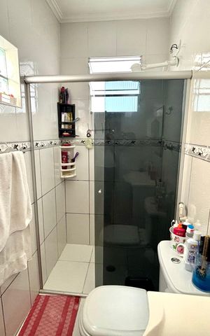 Casa à venda com 125m², 5 quartos e 2 vagas Casa à venda com 125m², 5 quartos e 2 vagasBanheiro da Suíte 1