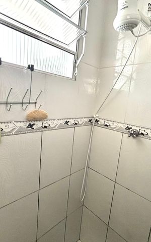 Casa à venda com 125m², 5 quartos e 2 vagas Casa à venda com 125m², 5 quartos e 2 vagasBanheiro da Suíte 1