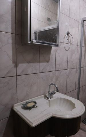 Casa à venda com 199m², 4 quartos e 2 vagasBanheiro