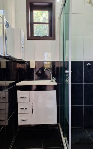 Casa de condomínio à venda com 258m², 3 quartos e 4 vagas Casa de condomínio à venda com 258m², 3 quartos e 4 vagasBanheiro da Suíte 1