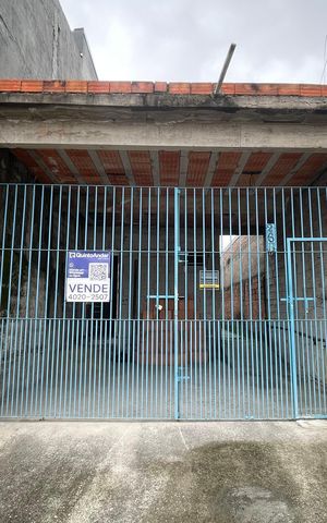 Casa à venda com 150m², 2 quartos e 2 vagas Casa à venda com 150m², 2 quartos e 2 vagasFachada+Placa