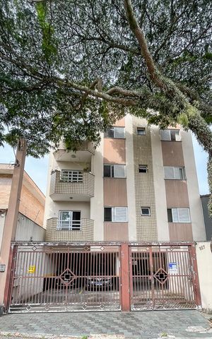 Apartamento à venda com 75m², 3 quartos e 2 vagasFachada + plaquinha