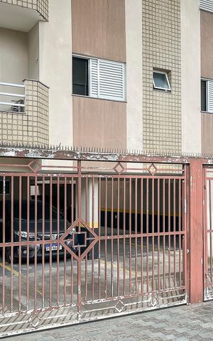 Apartamento à venda com 75m², 3 quartos e 2 vagasFachada + plaquinha