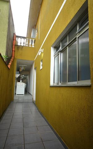 Casa à venda com 162m², 3 quartos e 2 vagasCorredor lateral 