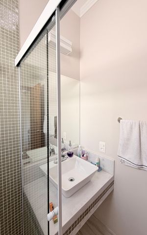Casa de condomínio à venda com 340m², 3 quartos e 4 vagasBanheiro da Suíte 1
