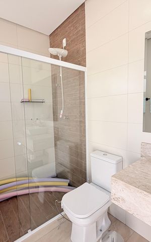 Casa de condomínio à venda com 340m², 3 quartos e 4 vagasBanheiro Externo