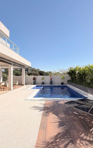 Casa de condomínio à venda com 340m², 3 quartos e 4 vagasQuintal com Churrasqueira e Piscina