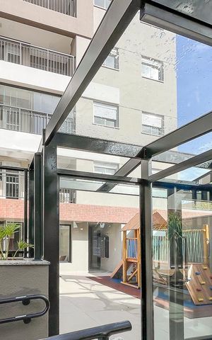Apartamento à venda com 69m², 2 quartos e 2 vagasFachada + plaquinha