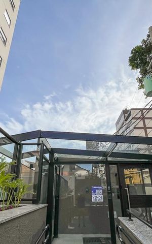 Apartamento à venda com 69m², 2 quartos e 2 vagasFachada + plaquinha