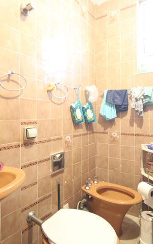 Casa à venda com 103m², 3 quartos e 3 vagasBanheiro 1